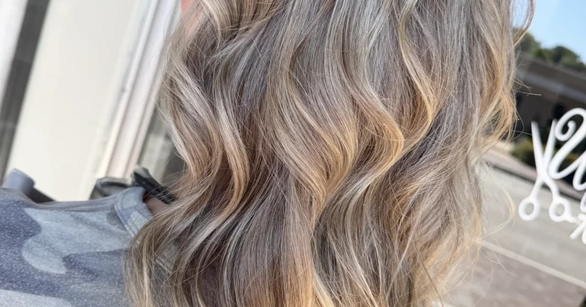 Bronde balayage with warm tones and natural dimension on long hair by Brooke Holland