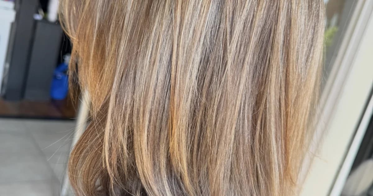 Blonde balayage lob with straight precision cut by Brooke Holland showing premium hairstylist pricing