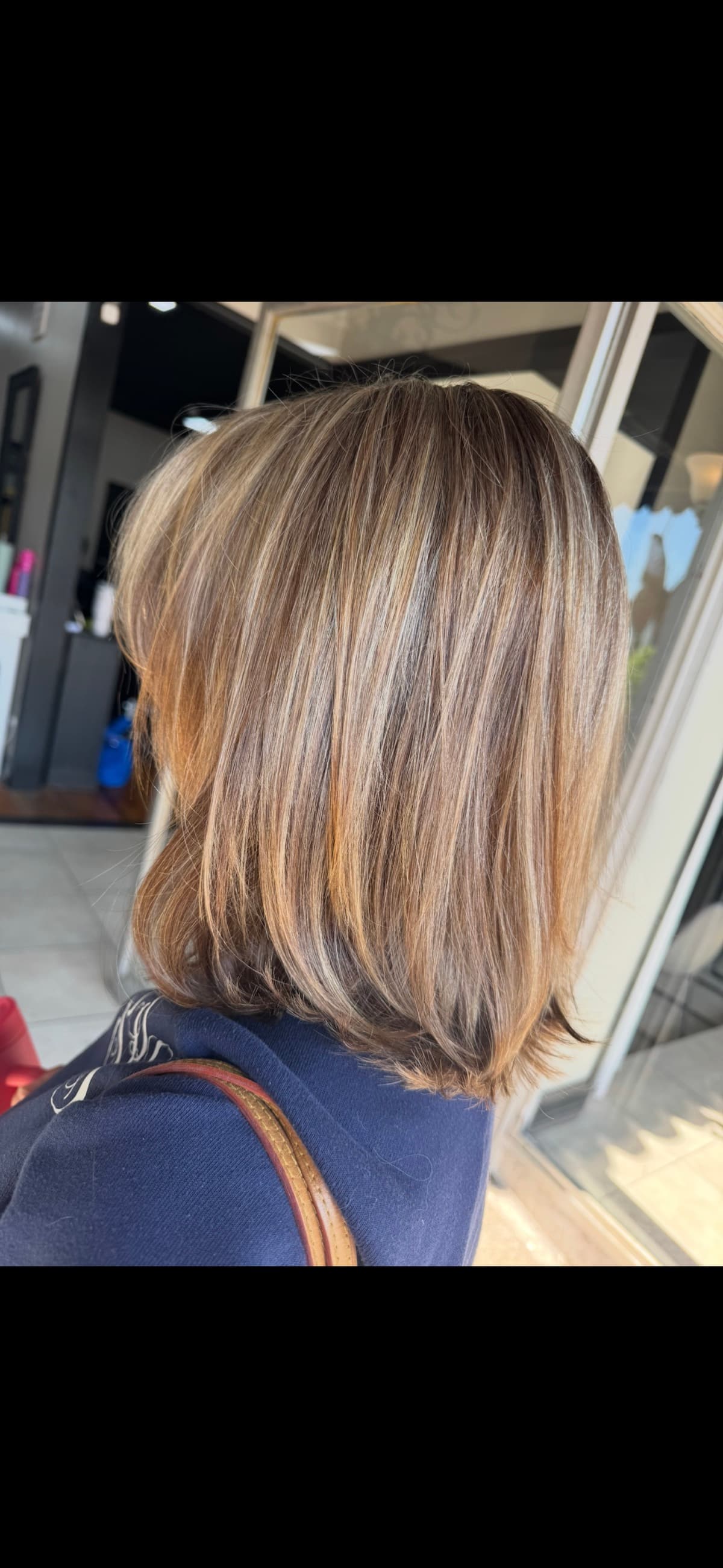 Blonde balayage lob cut by Brooke Holland