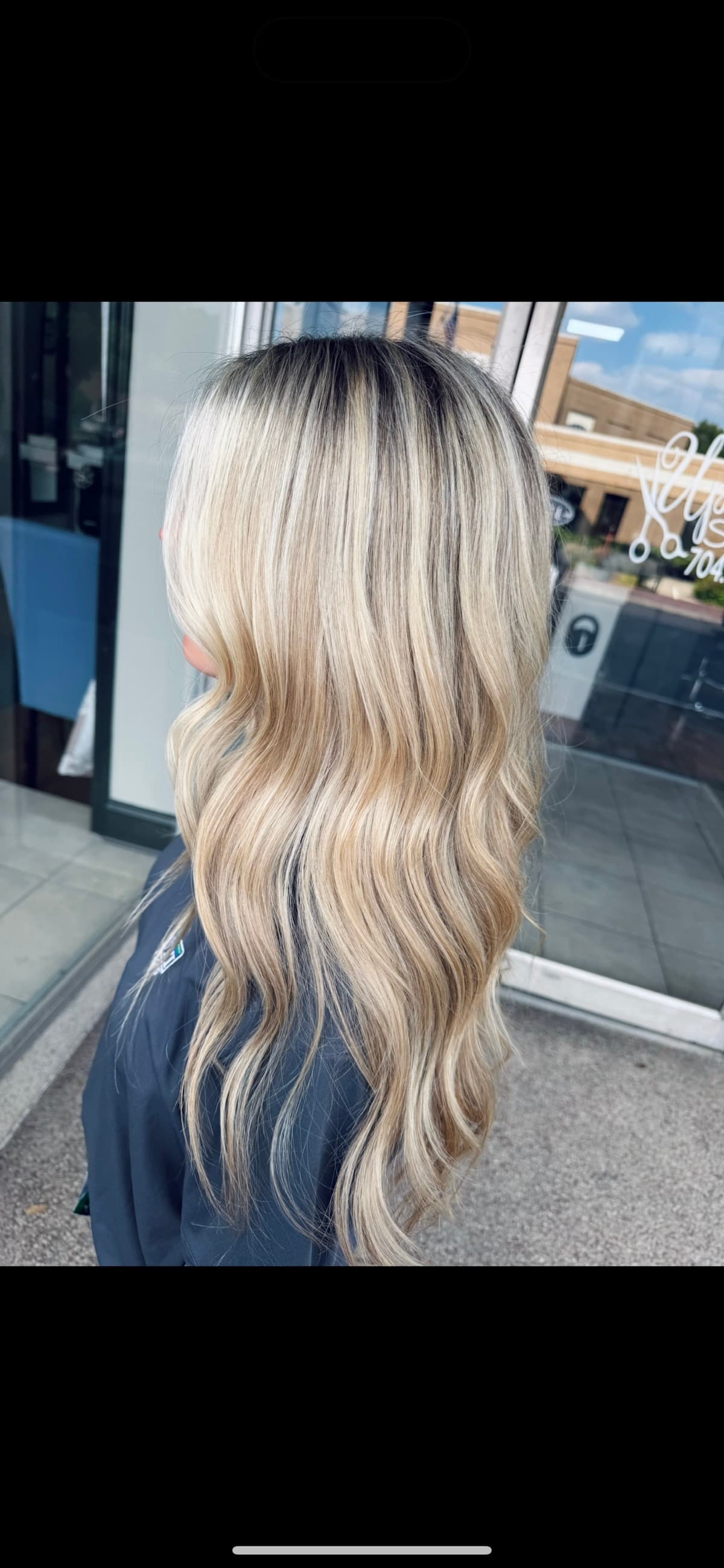 Platinum blonde dimensional balayage by Brooke Holland